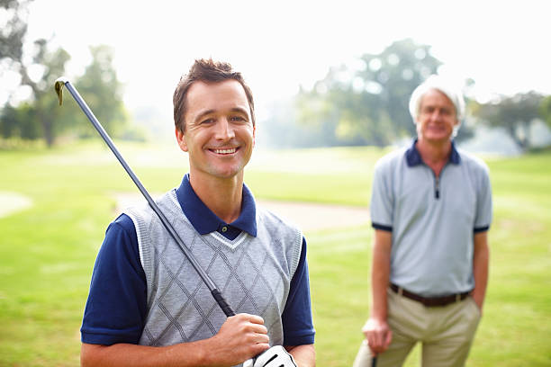 istock Male golfer smiling 183814504