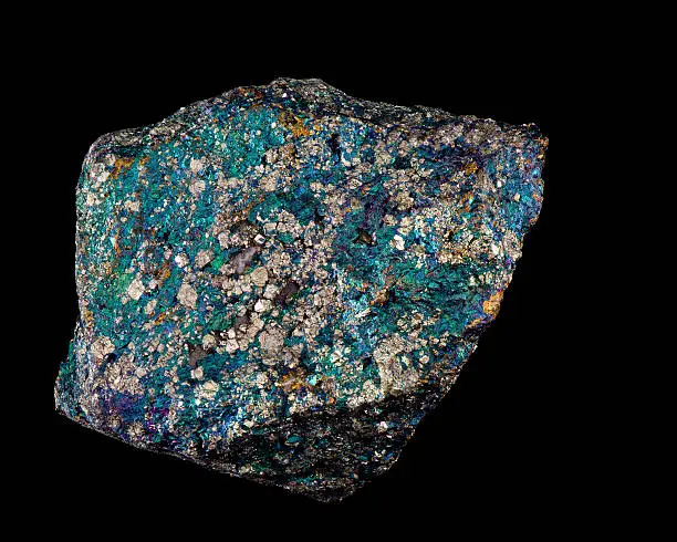 "Chalcopyrite ore sample, isolated on black"