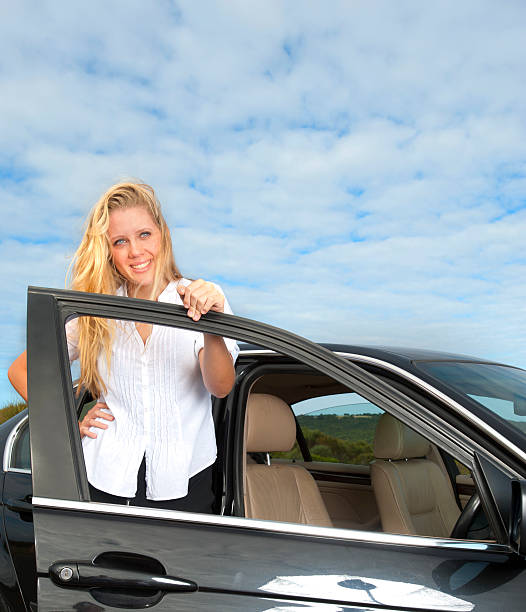 istock Young business woman with her car 183815085