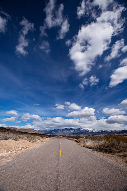 istock Country road and clouds 183815381