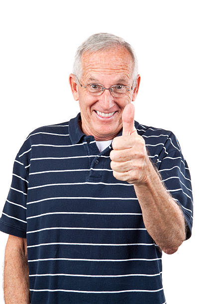 istock Old senior smiling with a thumbs up 183815956