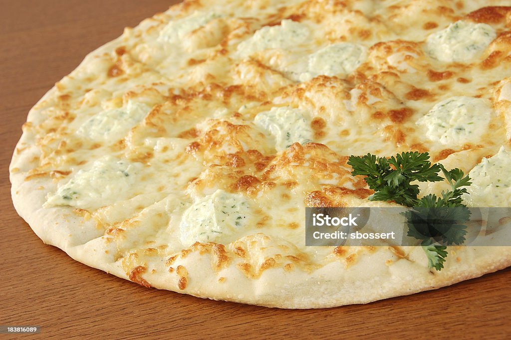 White Pizza "Gourmet white pizza with fresh mozzarella and herbed ricotta cheese.More images of pizza, focaccia, and tarte flambee:" White Pizza Stock Photo