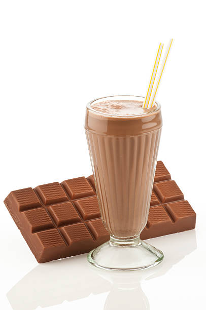 istock Chocolate milkshake with big chocolate bar on white backdrop 183816300