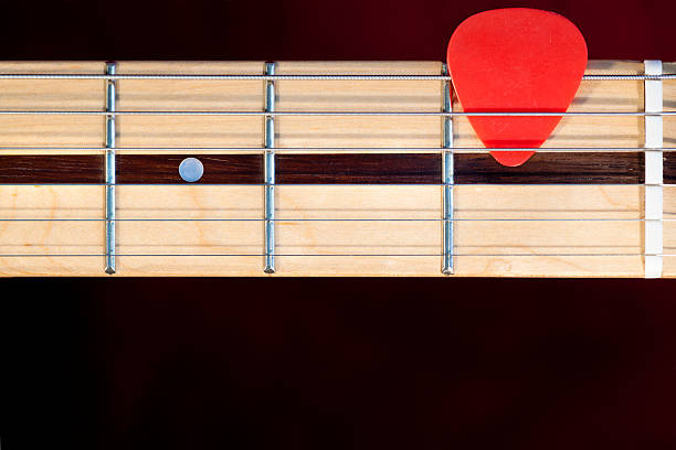 istock Guitar Freatboard with a Pick 183816664