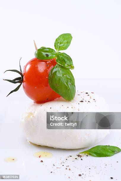 Mozzarella With Tomato Stock Photo - Download Image Now - Antipasto, Basil, Cheese