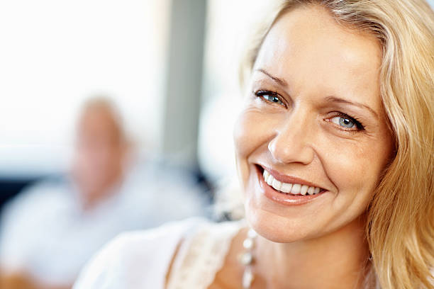 istock Beautiful, mature woman smiling 183817109