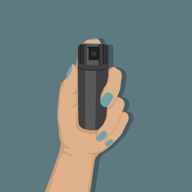 Female hand holding a spray can Female hand holding a pepper spray can vector flat illustration tear gas can stock illustrations