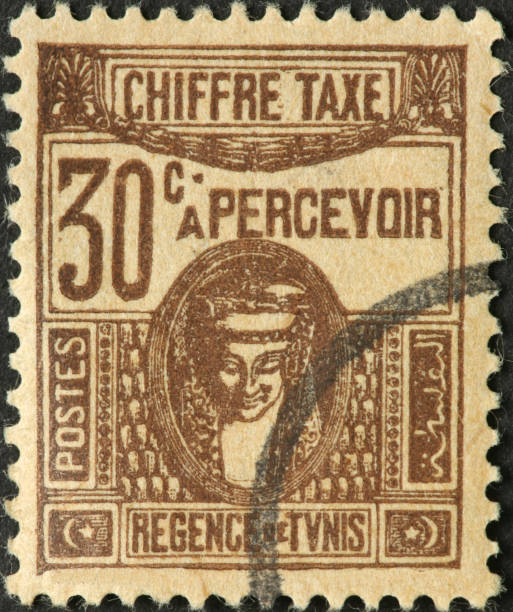istock very old Tunisian postage stamp with woman in braids 183817408