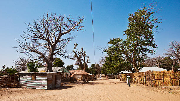 istock African village street. 183817523