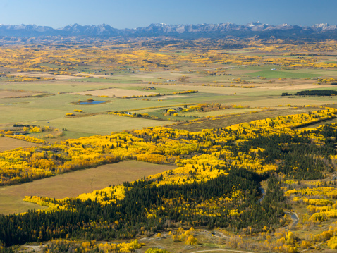 The colorful autumn foothills to the Rocky Mountains.  Viewing west from Calgary Alberta.