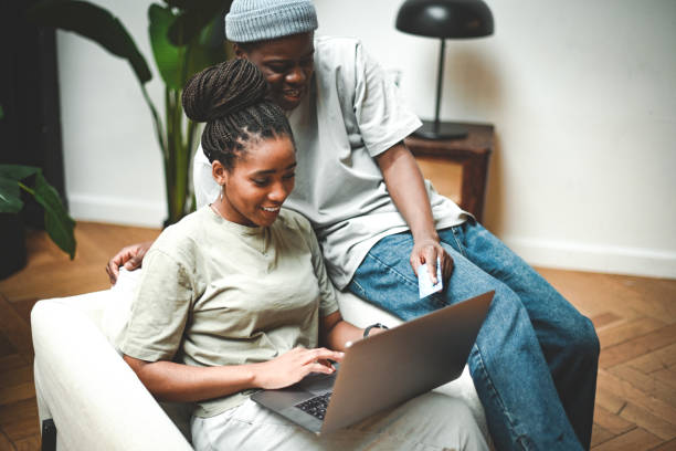 istock Man and woman using laptop 1838179231