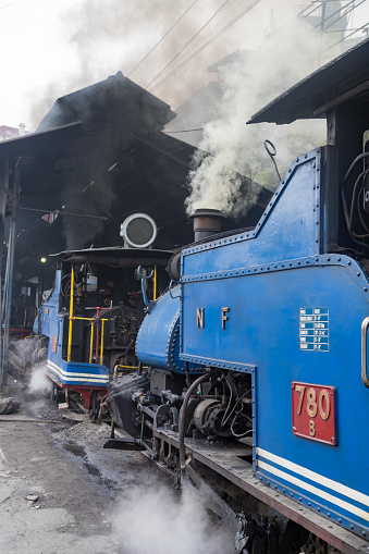 Darjeeling, west bengal,India,22 April 2022 Toy train of a narrow gauge railway in the depot, darjeeling. Darjeeling himalayan railway in the Indian state of west bengal.