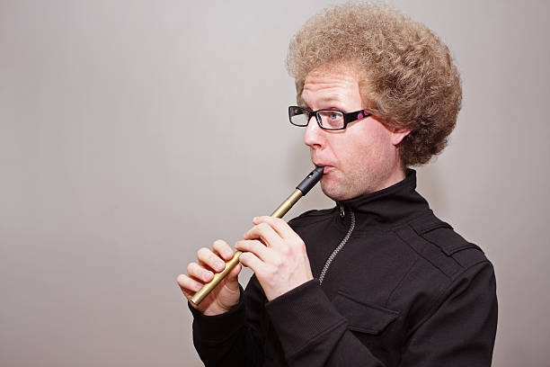 funky Penny Whistle player stock photo
