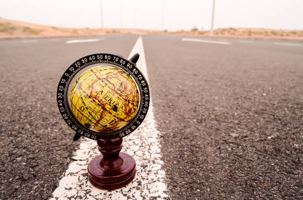 istock Globe Earth on an Asphalt Street 1838189898