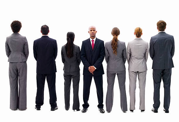 istock Businessman Facing Opposite From His Colleagues - Isolated 183819403