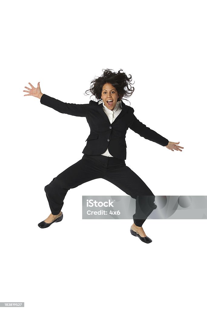 Woo hoo Femme d'affaires sautant en l'air - Photo de Femmes libre de droits