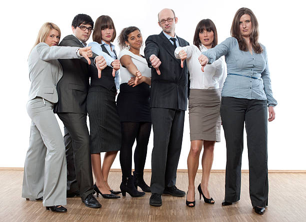 istock Business team with thumbs down 183819627