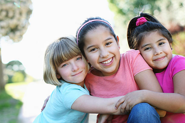 istock Three girls in the park 183819752