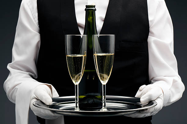 istock Champagne being served by a waiter 183821081