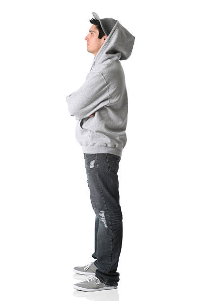 istock Profile of a man standing with arms crossed 183821567