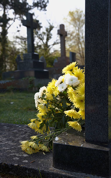 istock Churchyard cemetery flowers 183822655
