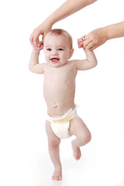 Smiling Baby Boy In A Diaper Sitting On The Floor Stock Photos ...