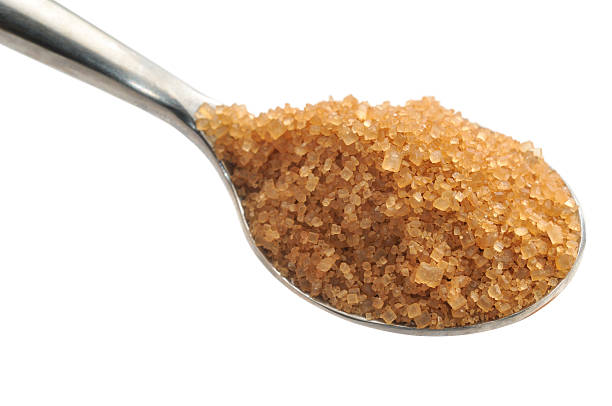 istock Spoonful of Raw Cane Sugar 183823728