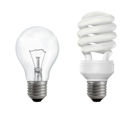 Classic (filament) and compact fluorescent lightbulbs isolated on white background.