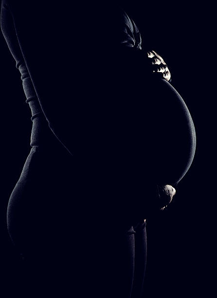 istock Pregnant Woman-Low Key 183824270