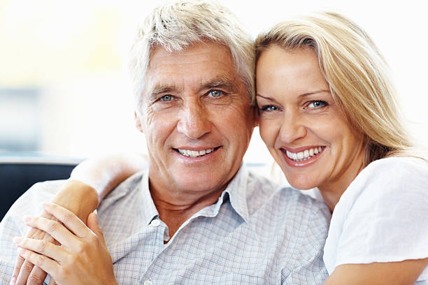 istock Romantic, retired couple smiling together 183824455