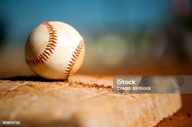 Youth League Baseball On First Base Close Up Stock Photo - Download Image Now - Baseball - Ball, Baseball - Sport, Base - Sports Equipment