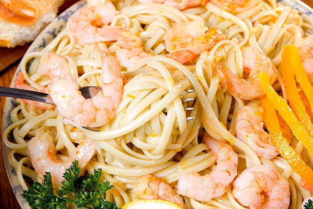istock Shrimp pasta with a organge and lemon garlic sauce. 183825762