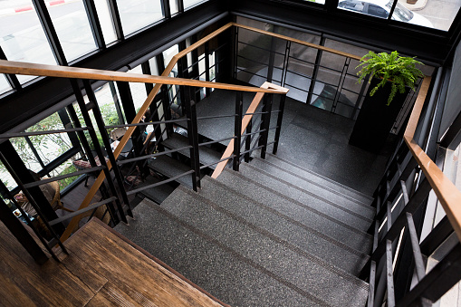 Indoor Concrete Staircase with wood handrail