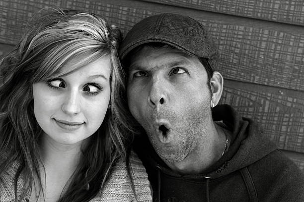 Father and Daughter Making Funny Faces