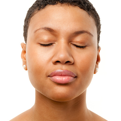 Portrait of a young woman on a white background. http://s3.amazonaws.com/drbimages/m/pripri.jpg