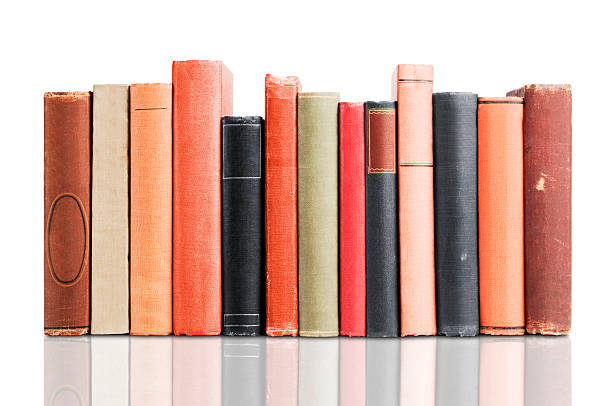 Old leather covered books isolated on white background