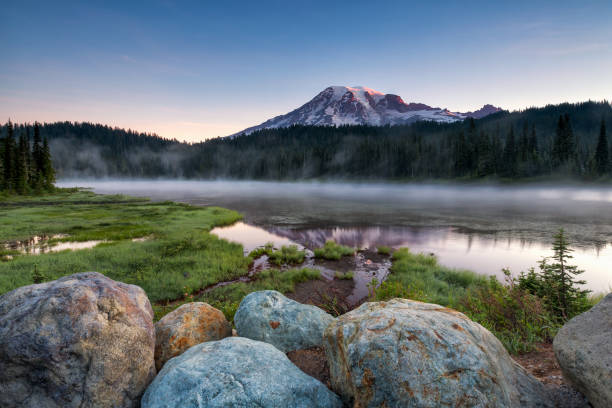 Scenic view of Mount Rainier reflected across the reflection lakes at sunrise
