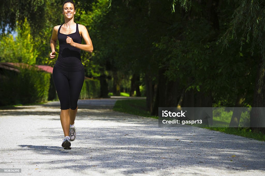 Sorridente runner - Foto stock royalty-free di Adulto