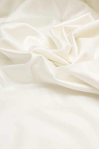 Ivory satin silk vertical background stock photo