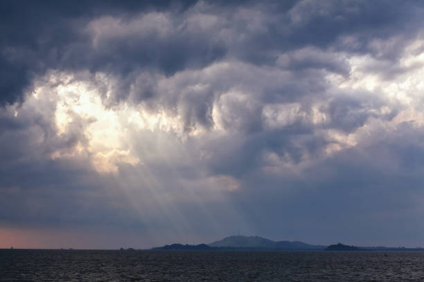 istock View of thunderstorm clouds above the sea 1838267205