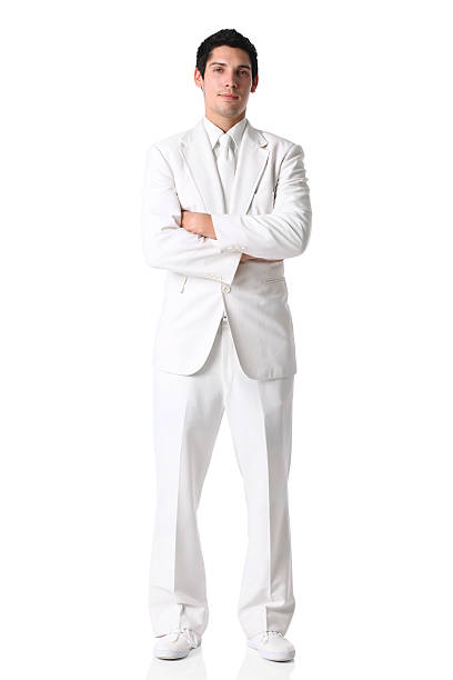 homme d'affaires debout en costume blanc - tenue stérile photos et images de collection