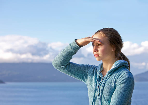 istock Girl Looking out to Sea 183827032