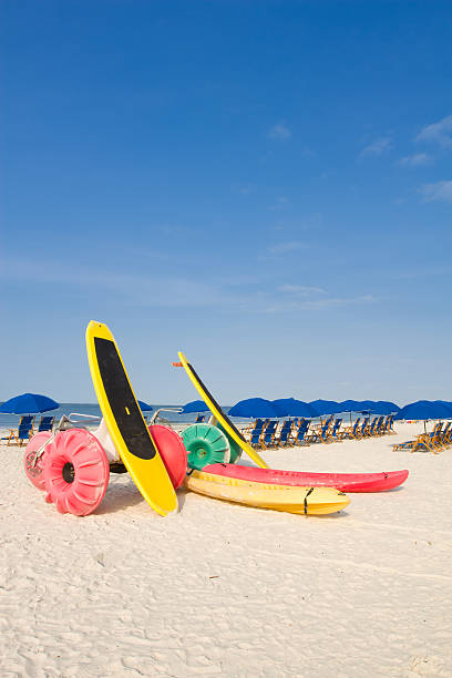 Beach with Water Bikes and Surf Boards