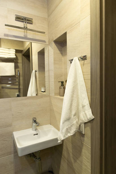 istock shower room, mirror, white towel, soap, gel 1838273608
