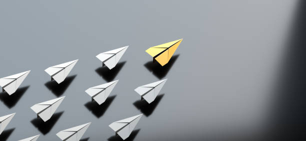 istock Leadership concept, yellow leader plane leading white planes, on black background with empty copy space on right side 1838273621