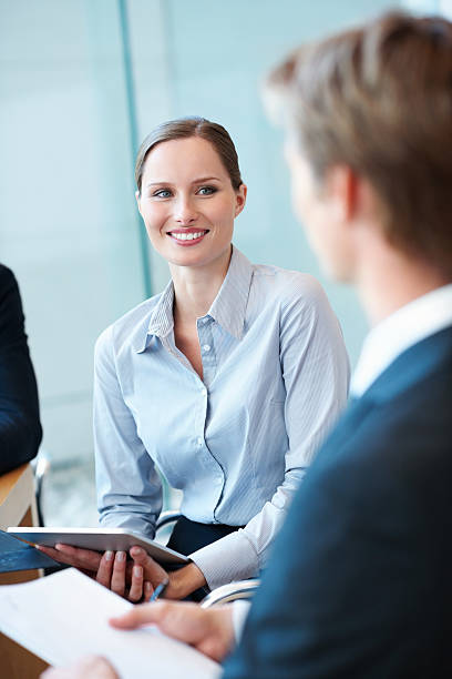 istock Pretty business woman smiling 183827712