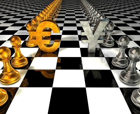 Euro and Yen symbol and chess pieces