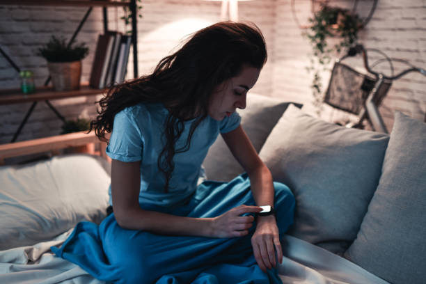 istock Female Setting Up Smartwatch To Monitor Sleeping Patterns 1838279938