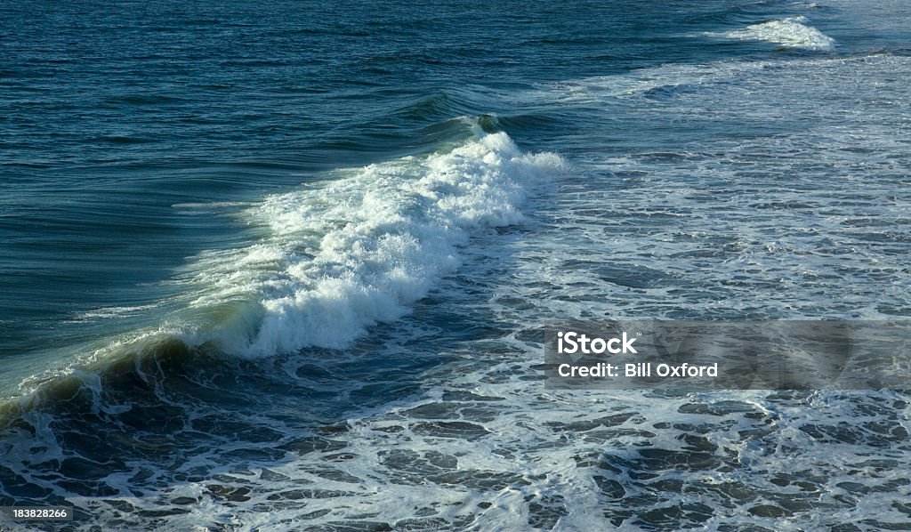 wave crashing Wave crashing in ocean shot from high angle. Shot from Oceanside Pier in Oceanside California. Beach Stock Photo