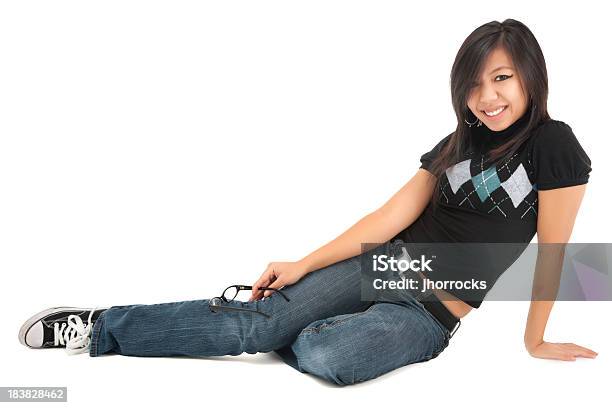 Cheerful Casual Young Asian Woman Sitting On Floor Stock Photo - Download Image Now - 18-19 Years, 20-29 Years, Adolescence